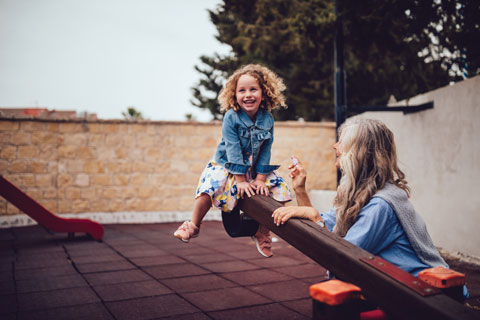 child on playground with tiles